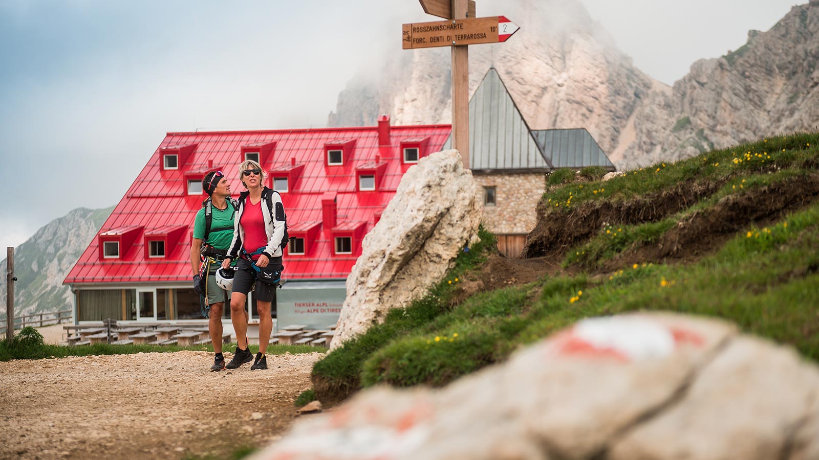 A couple on an excursion to Fiè allo Sciliar